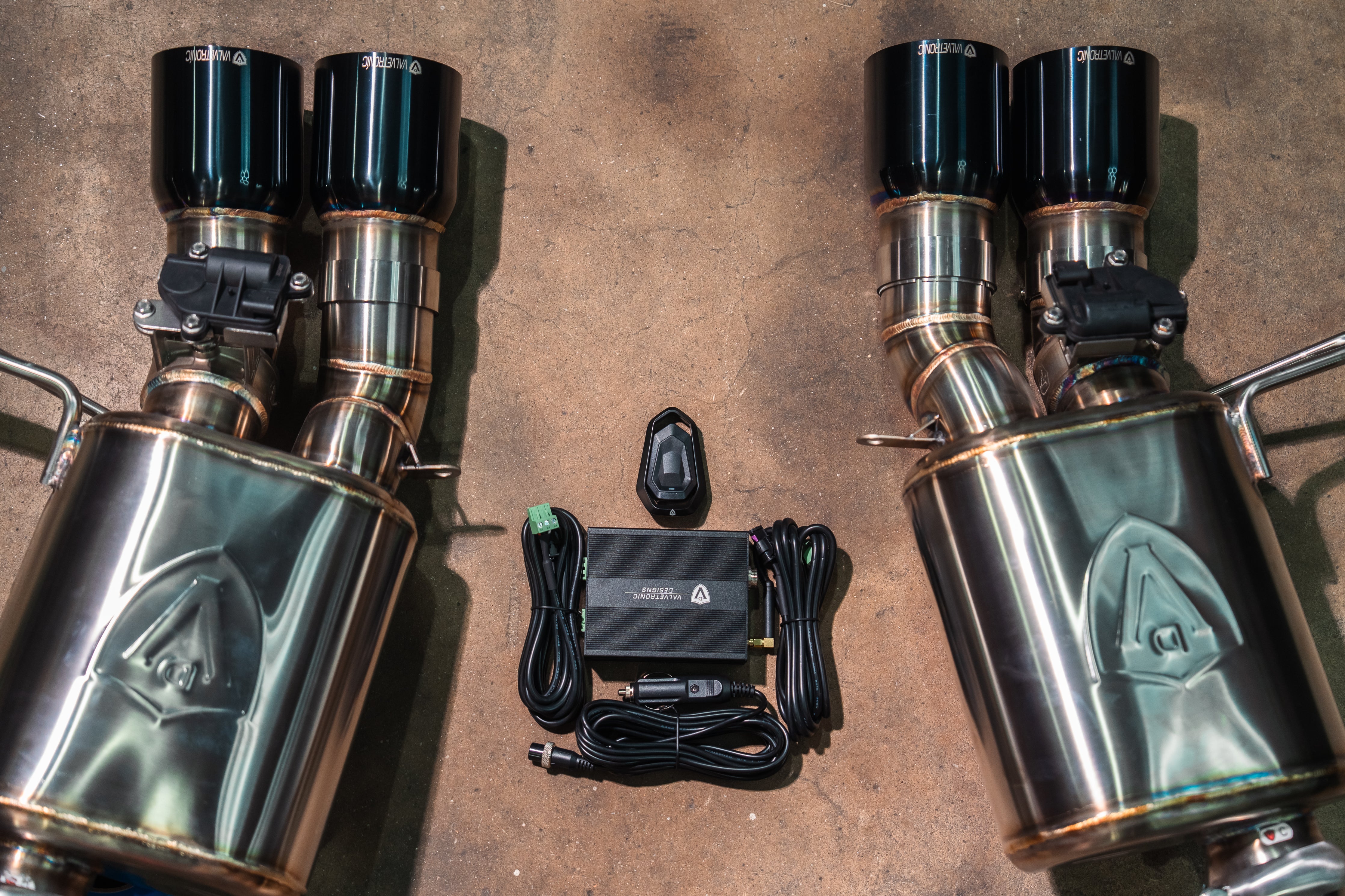 Valvetronic Designs Valved Exhaust Corvette C7 manufacturer gallery: twin mufflers with control module and remote between them