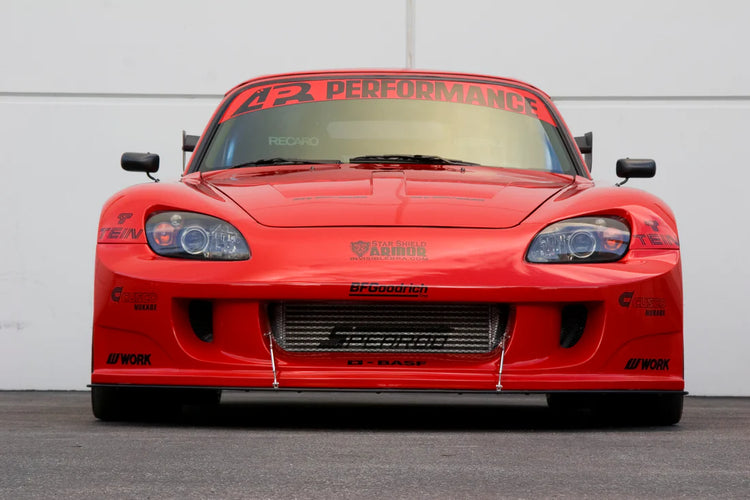 A front view of a red car fitted with APR Performance S2-GT Widebody Aerodynamic Kit Honda S2000 2000-2009