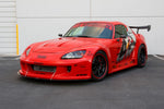 A side wide view of a red car fitted with APR Performance S2-GT Widebody Aerodynamic Kit Honda S2000 2000-2009