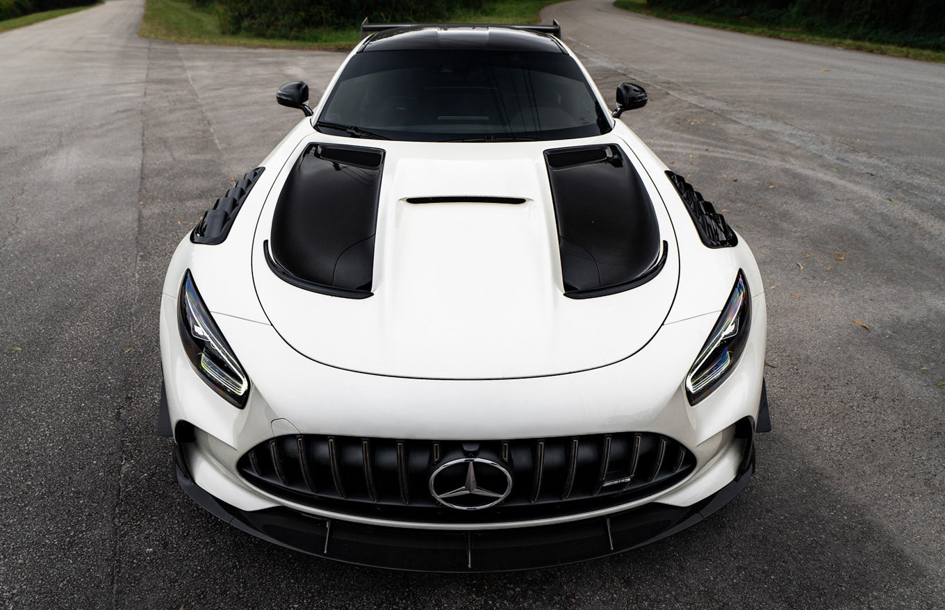 White AMG GT Black Series car front view with carbon inserts - Carbon Fender Extractor Inserts for the 2021 AMG GT Black Series