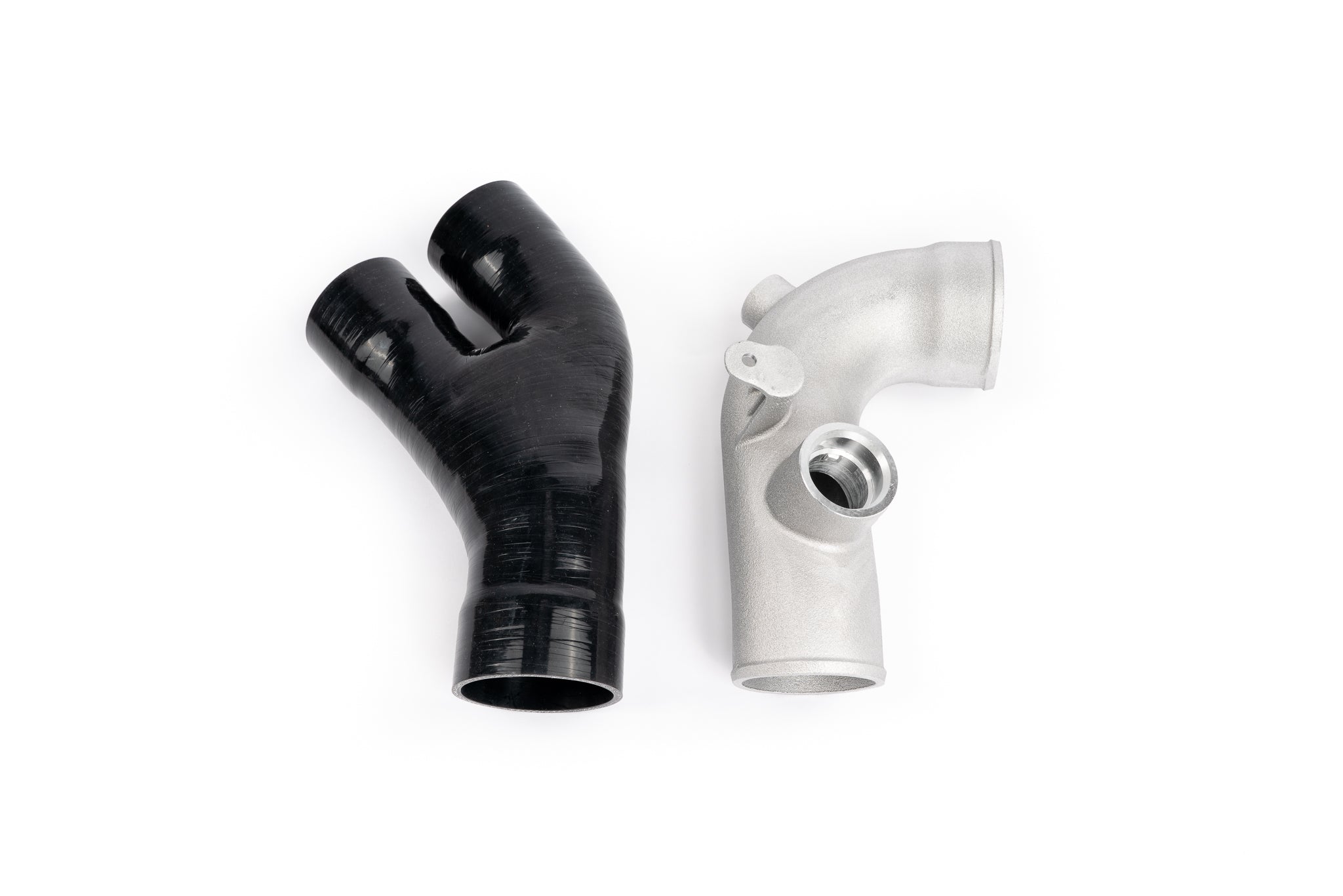 Silicone coupler and cast aluminum intercooler outlet tube with integrated blow off valve mount