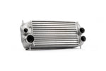 Rear of the AMS F-150 stock location intercooler showing the inlet and outlet ports