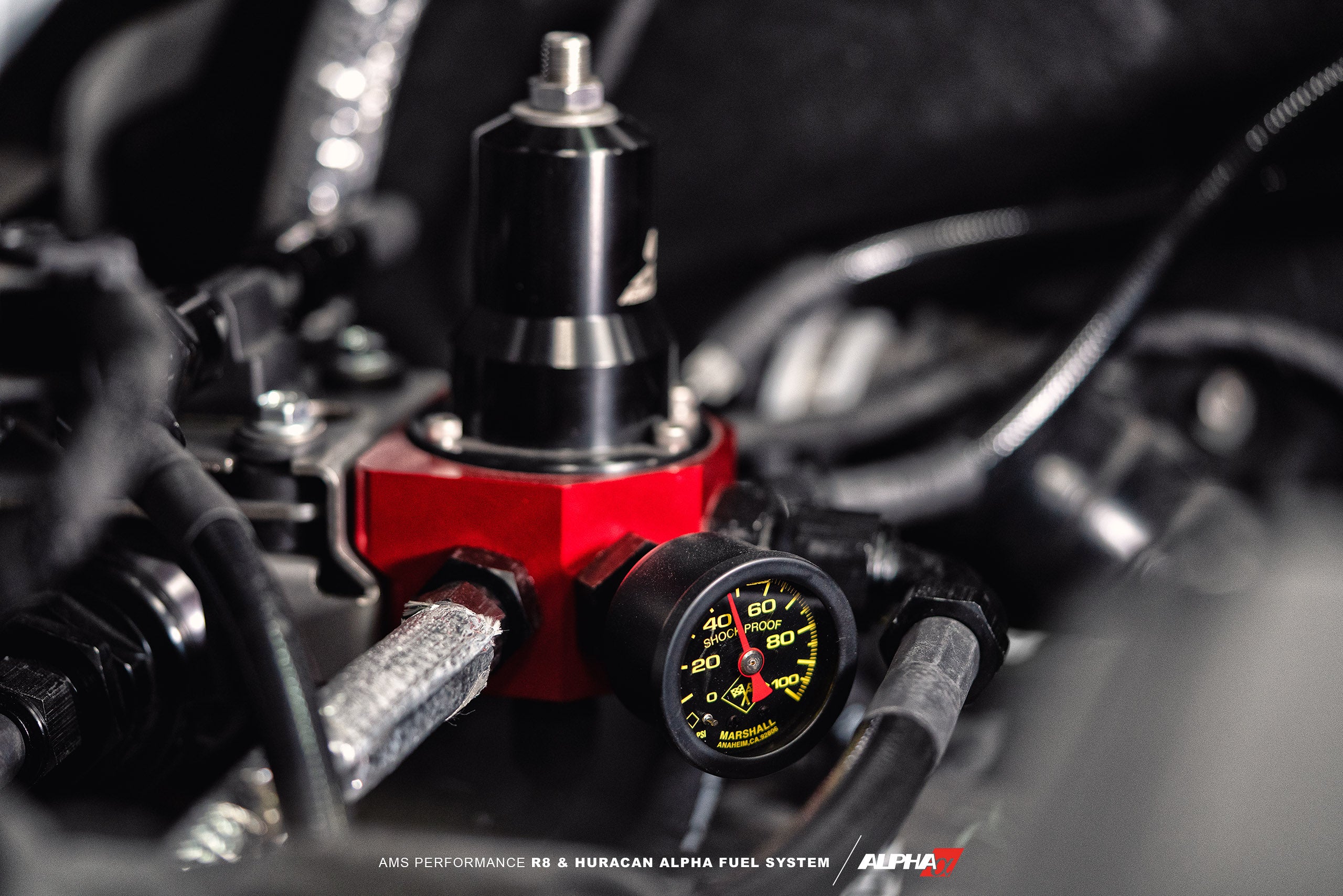 AMS Alpha regulator and Marshall gauge installed in a V10 engine bay