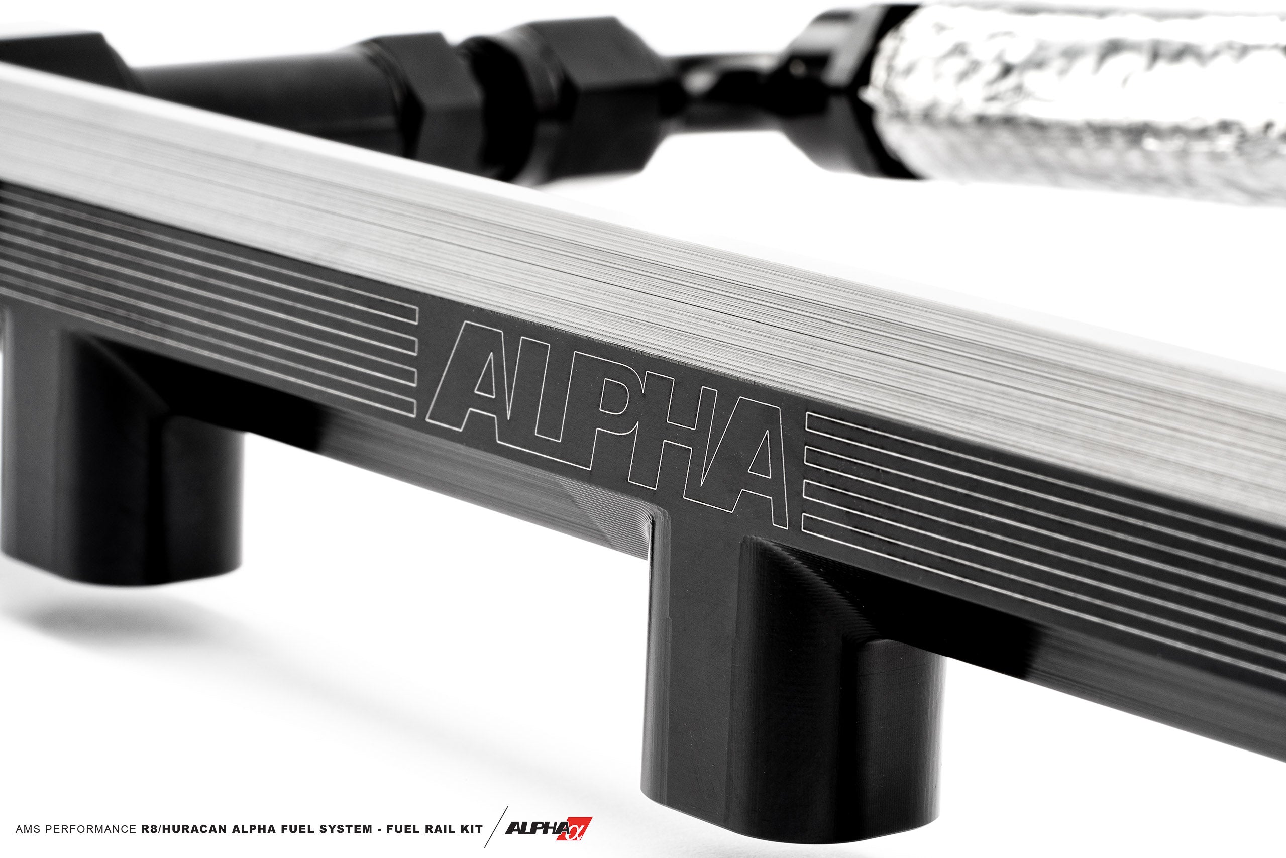Close-up of the Alpha engraved black billet AMS fuel rail