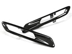 A front view of AUTOTECKNIC REPLACEMENT CARBON FIBER FENDER LIGHT TRIMS - BMW F10 SEDAN/ F11 WAGON | 5 SERIES 2010-2016 with white background