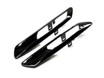 A front view of AUTOTECKNIC REPLACEMENT GLAZING BLACK FENDER LIGHT TRIMS - BMW F10 SEDAN/ F11 WAGON | 5 SERIES 2010-2016 with white background