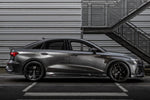 A side wide view of a grey car fitted with Urban Automotive Carbon Fiber Side Skirts Audi RS3 8Y 2022+