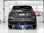 Rear view of a gray Mk3 Focus ST in a white garage with AWE twin Chrome Silver center tips