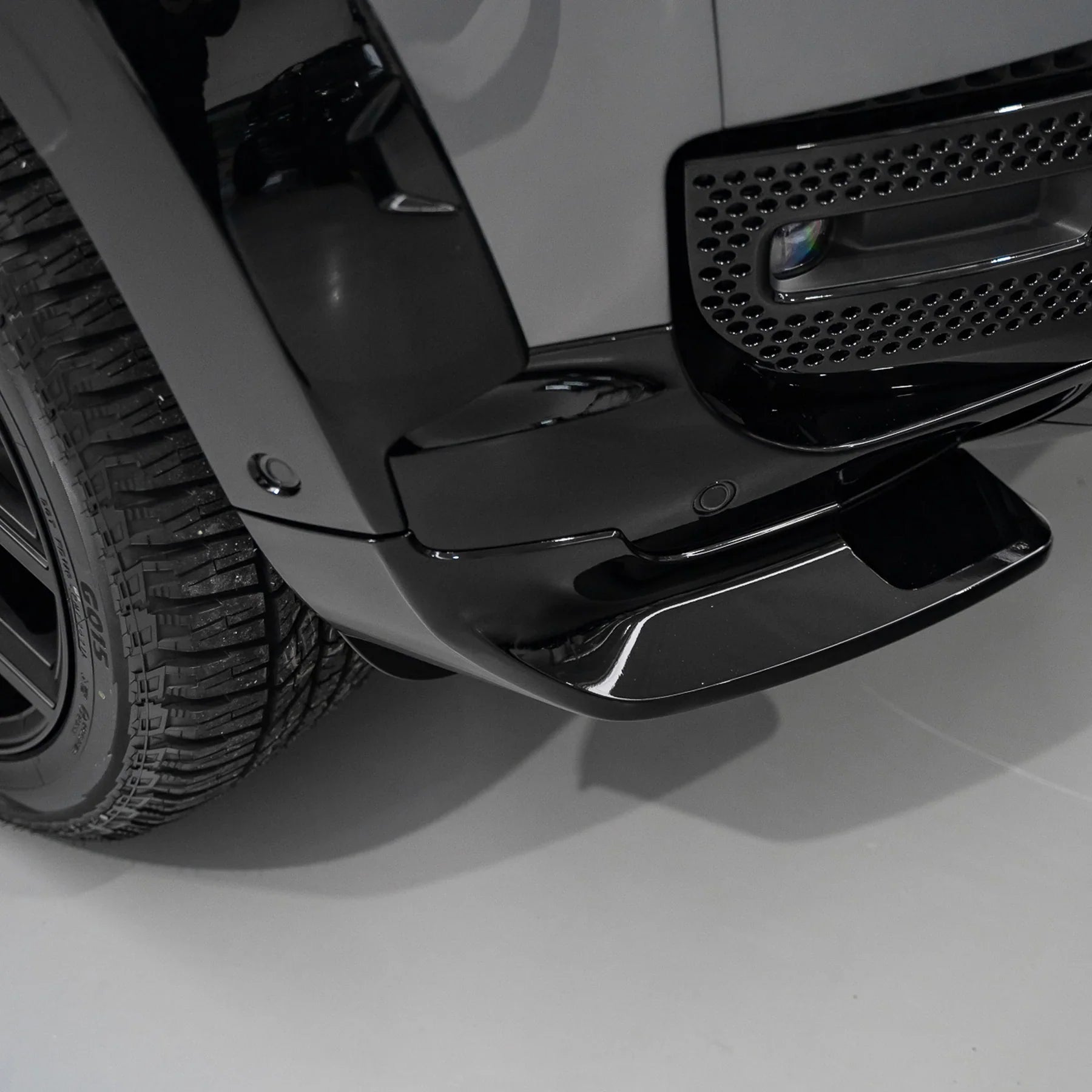 Close-up of the Urban canard on the front bumper of a Land Rover Defender