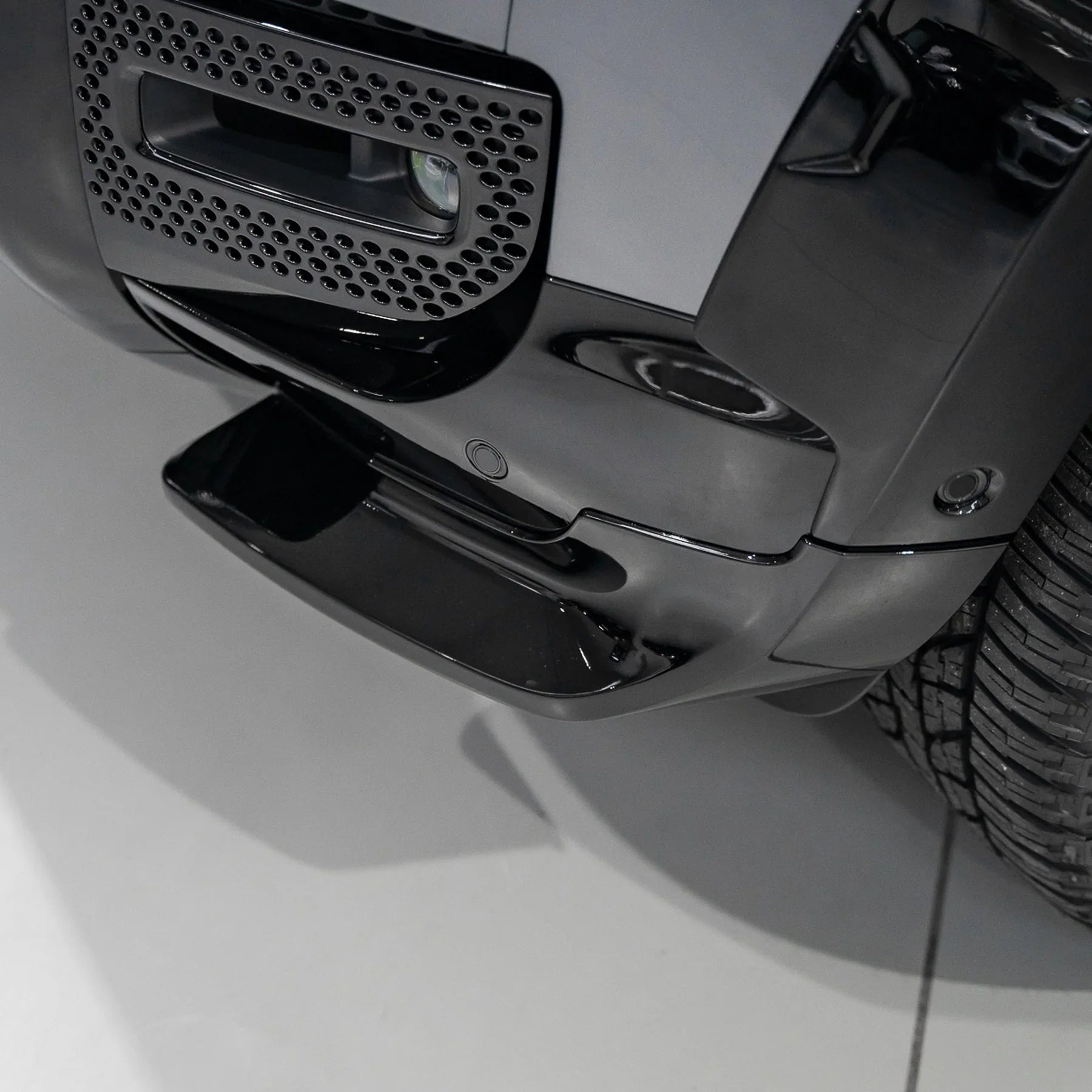 Urban front bumper canard fitted to the lower bumper of a Land Rover Defender