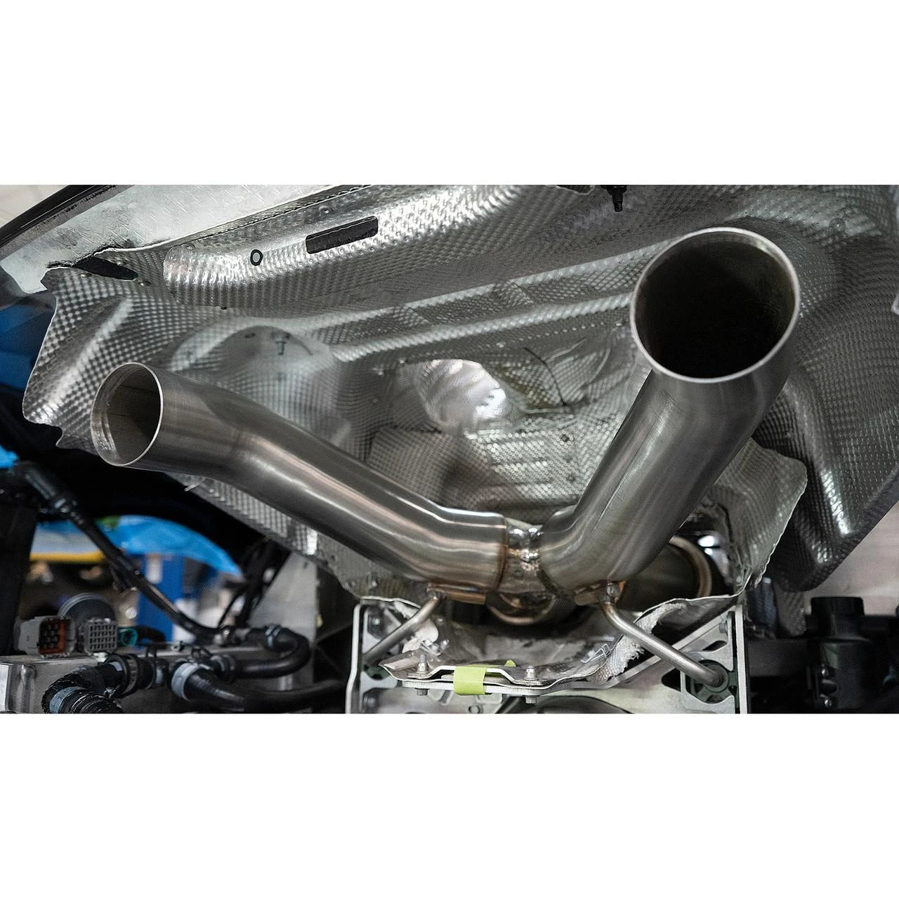 Fabspeed McLaren Artura X-pipe installed, angled rear view