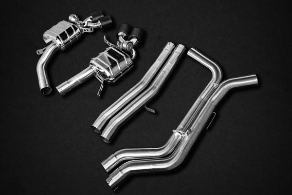 wide view of Capristo Valved Exhaust Carbon Fiber Tips E2P for Audi RS6 C8 2019-2025 with black background
