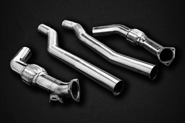 wide view of Capristo Valved Exhaust Bevelled Carbon Fiber Tips E2P for Audi RS6 2019-2025 with black background