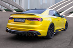 Yellow Audi RS5 coupe rear three-quarter showing Capristo carbon diffuser