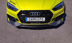Close-up of Capristo carbon front spoiler under grille of yellow Audi RS5