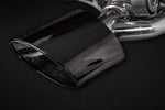 Close-up of black oval RS tip on Capristo Audi RS5 F5 valved exhaust
