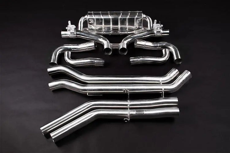 wide view of Capristo Valved Exhaust with Middle Silencer Spare and Wicrom Tips (OE Actuators) for Lamborghini Urus/S 2018+ with black background