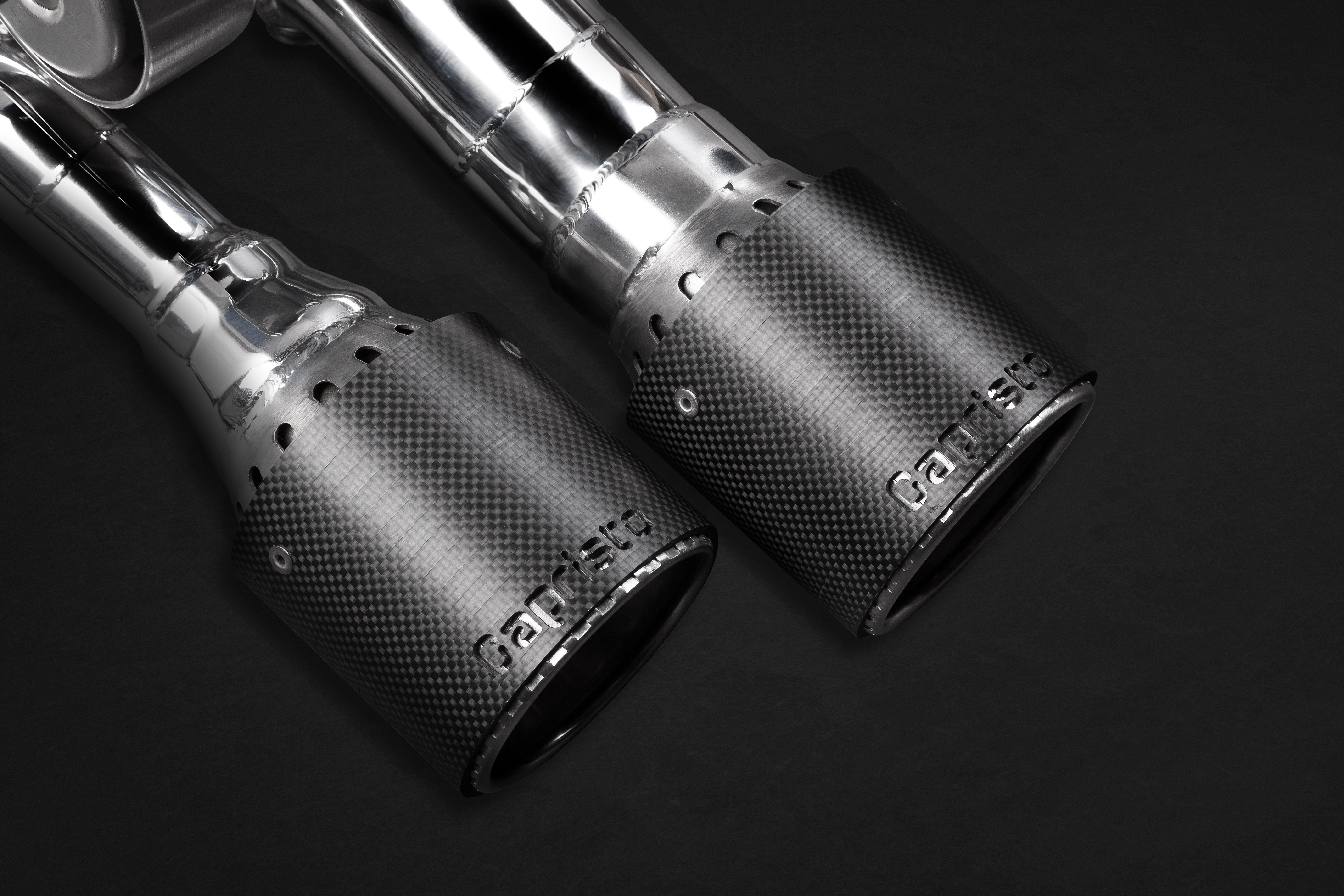 Close-up of Capristo carbon fiber round tips for Audi S8 D4 valved exhaust