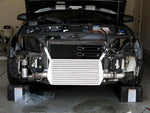 A front view of Polished Evolution Racewerks Audi A4 (B7) Competition Series Front Mount Intercooler (FMIC) Kit installed in a car