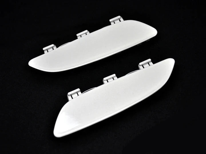 A top view of AUTOTECKNIC PAINTED FRONT BUMPER REFLECTORS - E9X M3 2007-2013 with black background