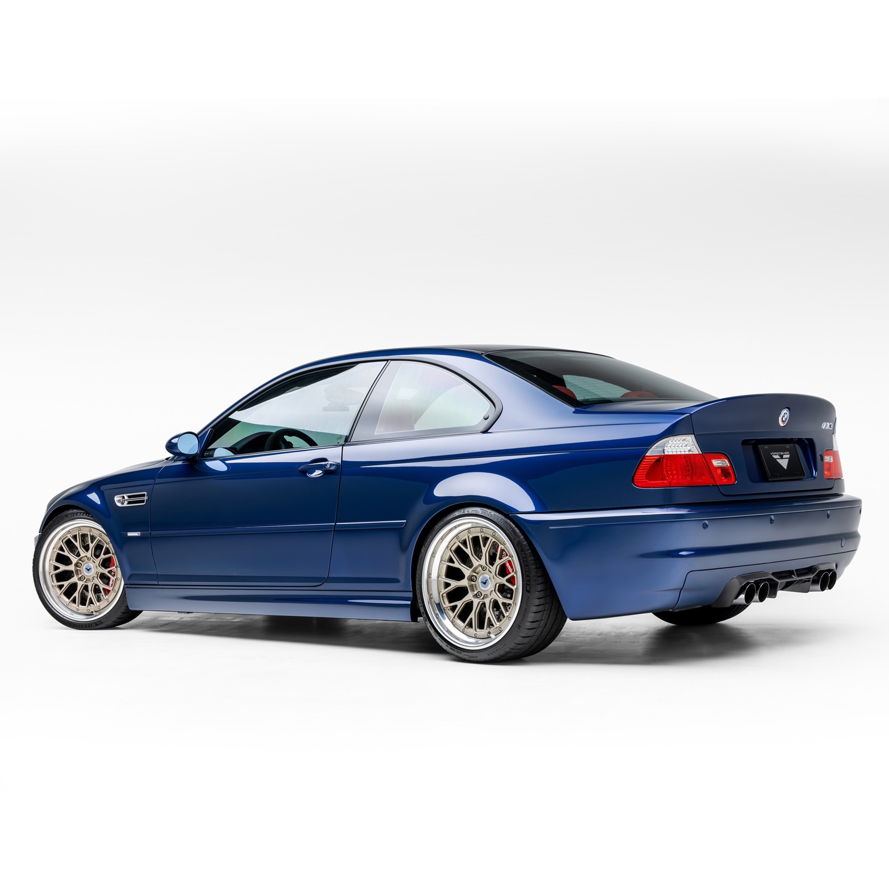 Blue E46 M3 with V20 diffuser, rear 3/4 of car