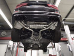 wide view of Capristo Exhaust Exhaust System, OPF Delete Mid Pipes, and Carbon Fiber Tips for BMW X3M Competition 2019-2022 fitted inside a car