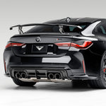 Carbon rear diffuser on black BMW G82 M4, rear 3/4 view