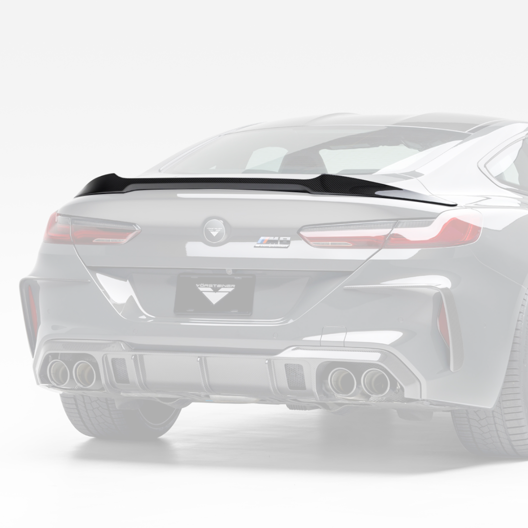 M8 VRS decklid spoiler, faded rear view highlighting carbon