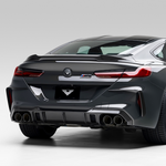 Carbon VRS rear diffuser on black BMW F9X M8, rear 3/4 view