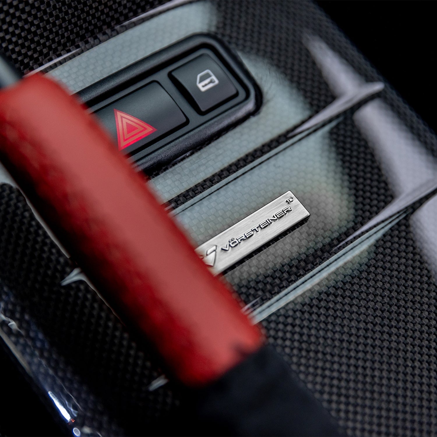 V-CSL console with red handbrake boot, macro detail