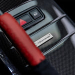V-CSL console with red handbrake boot, macro detail