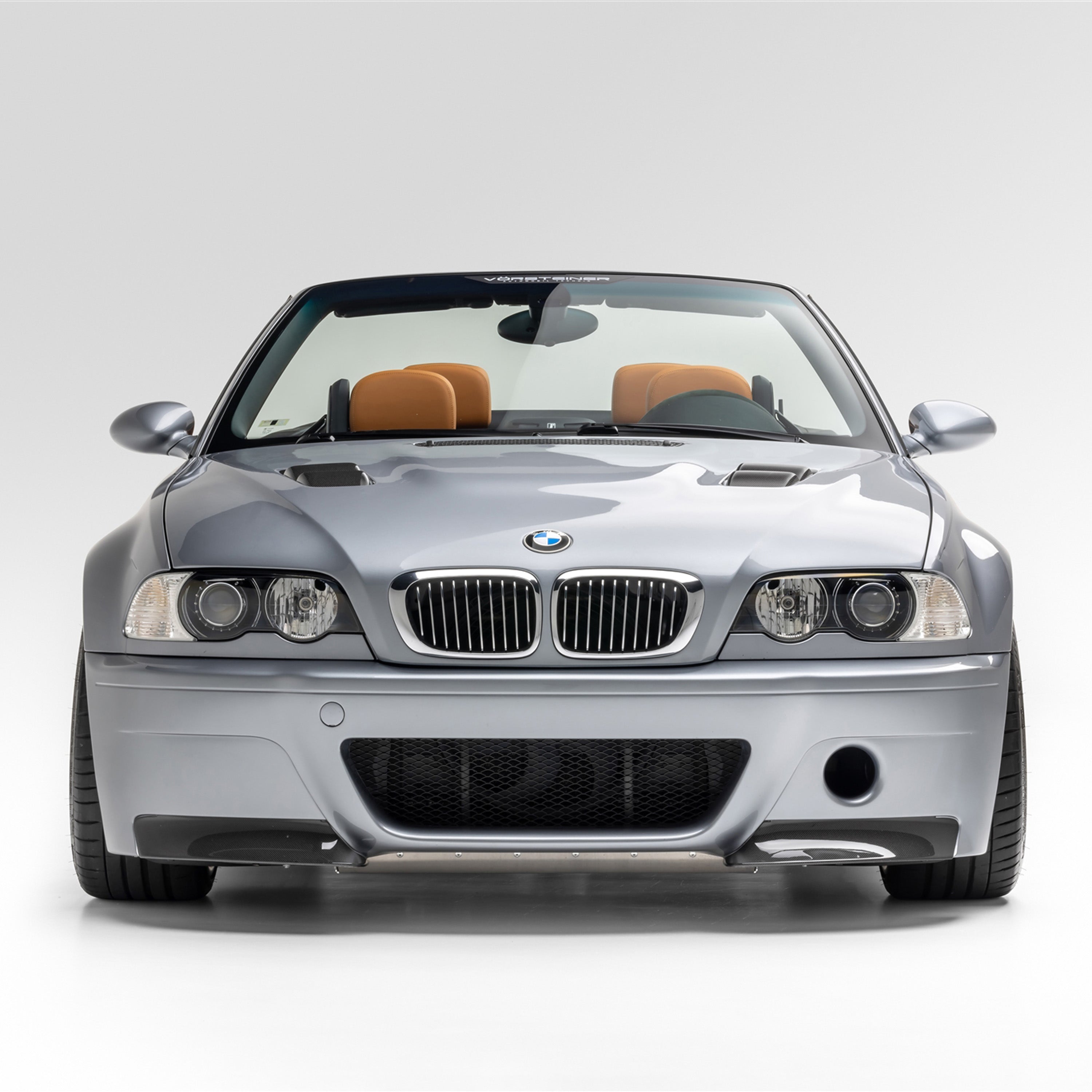 Silver E46 M3 with V-CSL front bumper, head-on view