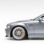 E46 M3 V-CSL bumper and front wheel, side 3/4 view