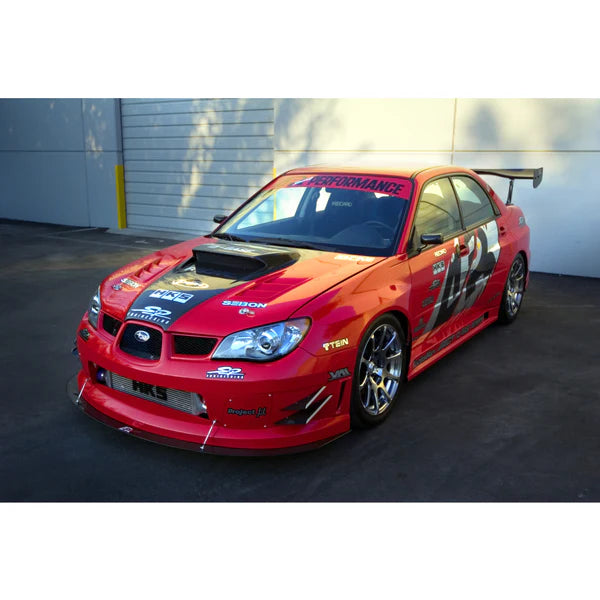A side wide view of a red car fitted with APR Performance SS/GT Widebody Aerodynamic Kit Subaru Impreza WRX 2006-2007
