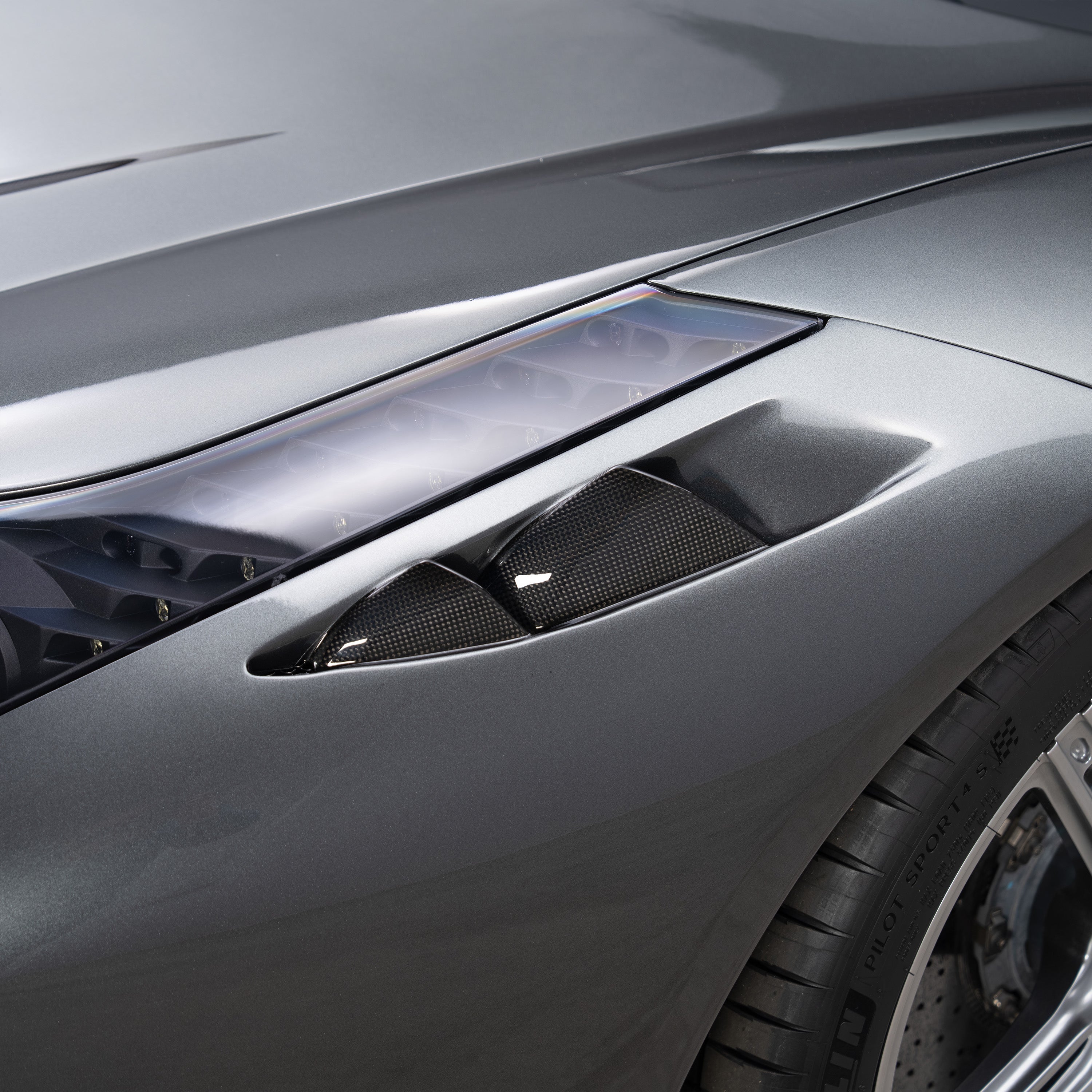 CTR front fender vent on Ferrari 458, angled close-up