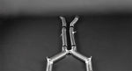 close top view of Capristo Valved Exhaust with Mid-Pipes (incl. Cat Delete) (OE Actuators) for Mercedes AMG GTR 2017-2021 with black background