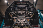 Wide bottom view of Capristo OPF Replacement 100 Cell Valve Muffler & Performance Headers Set with Wicrom Tips for Porsche 718 GT4RS 2021-2025 fitted inside a car