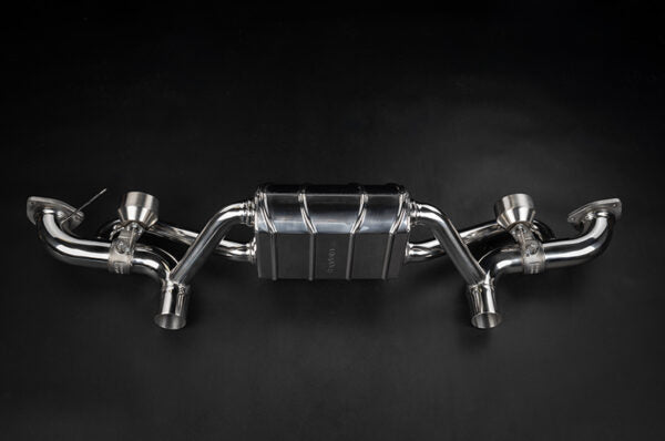 wide front view of Capristo Valved Muffler for OE Tips for Porsche 718 GT4RS 2021-2025 with black background