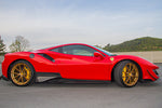 Red Ferrari 488 Pista fitted with Capristo carbon fiber side skirts, side profile