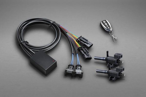 wide view of Capristo Valved Exhaust with Mid-Silencer Delete and Carbon Tips (CES3) for Porsche 536 Cayenne 3.0T / E-Hybrid 2019+ with grey background