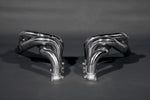 close view of Capristo Racing Valved Exhaust with Headers and Cat Delete (CES3) for Porsche 987 Boxster/Cayman MK2 2005-2012 with black background