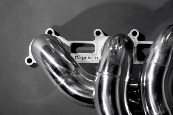 close top view of Capristo Racing Valved Exhaust with Headers and Cat Delete (CES3) for Porsche 987 Boxster/Cayman MK2 2005-2012 with black background