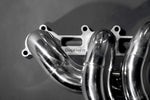 close top view of Capristo Racing Valved Exhaust with Headers and Cat Delete (CES3) for Porsche 987 Boxster/Cayman MK2 2005-2012 with black background