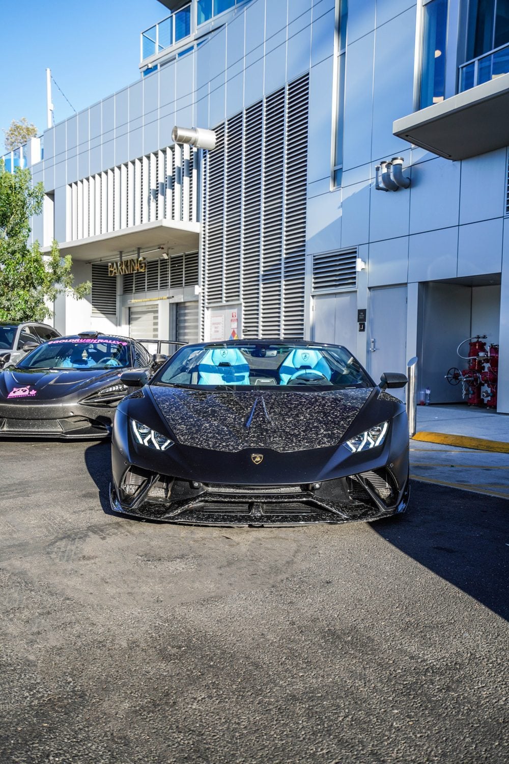 Black Huracan Performante with forged carbon front lip and hood, head-on