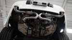 Installed Fabspeed 993 Supersport X-pipe seen under the rear bumper