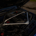 wide view of TRE Pre-Preg Carbon Fibre TR87 Strut Brace for BMW M3 / M4 / M2 2021+ fitted inside a car