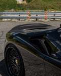 Race spoiler on a black Ferrari SF90, side close-up