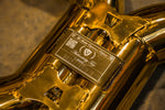 Valvetronic Designs F1 Exhaust McLaren 650S / MP4-12C manufacturer gallery: identification plate on the gold-colored crossover tube