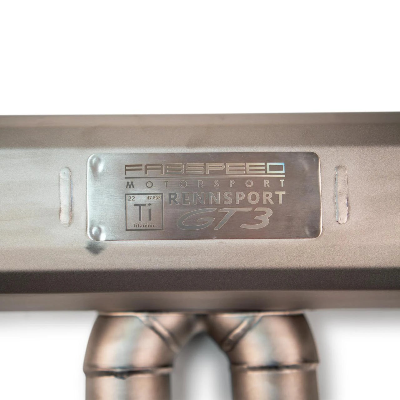 Fabspeed Motorsport badge plate on the GT3 RS center muffler