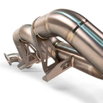 Fabspeed GT4 RS titanium exhaust bracket and bends, close view